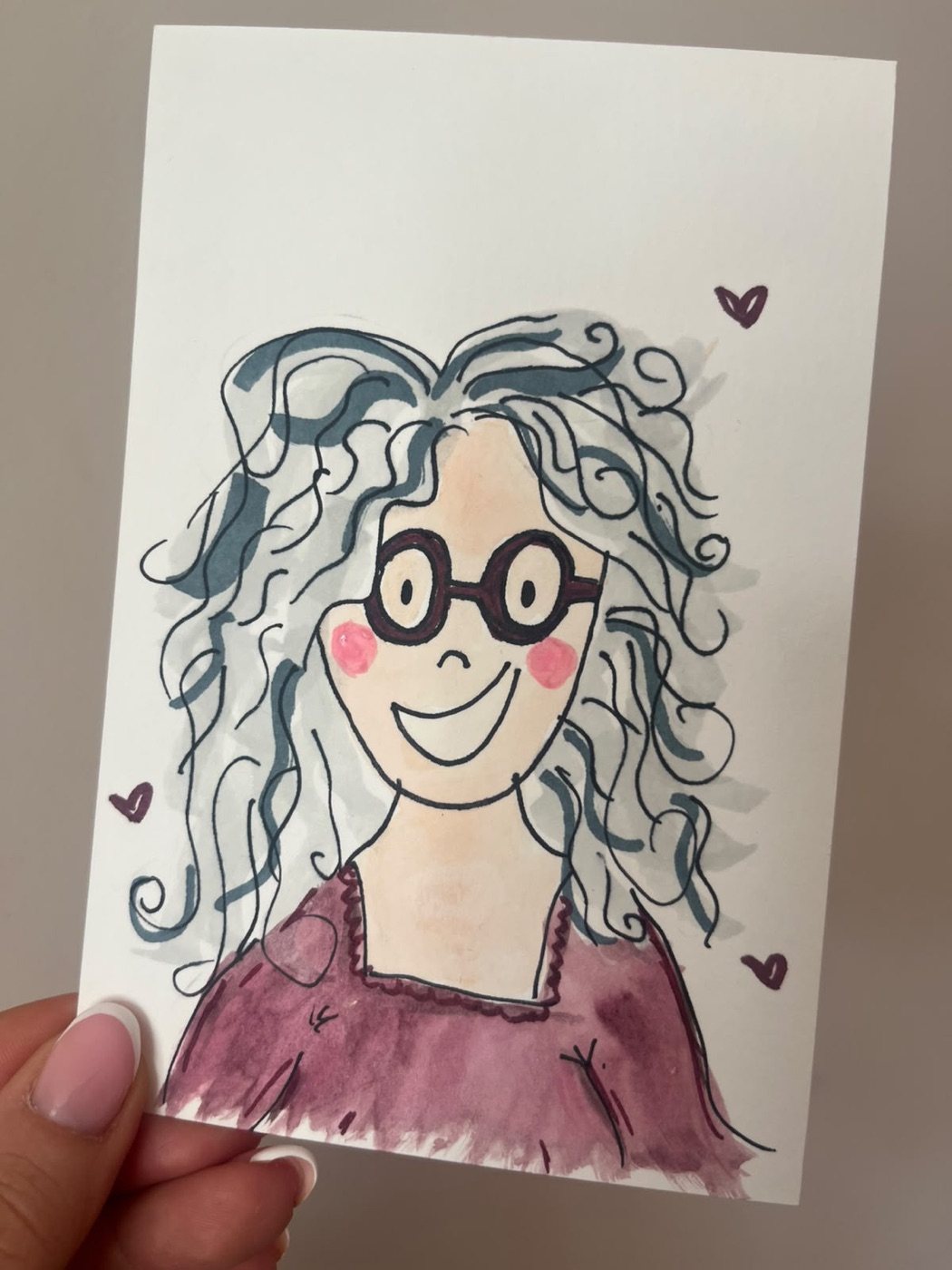 Watercolour doodle of a guest with curly blue-grey hair, round glasses and a plum top